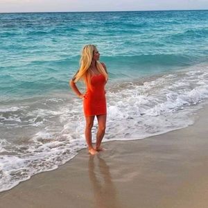 💚Small/Medium Bebe Bodycon Dress with Back cutout